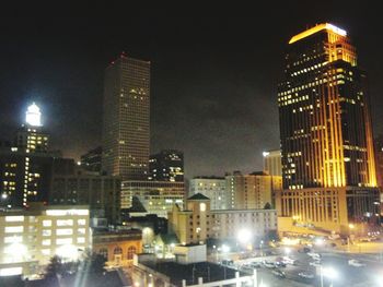 Illuminated cityscape at night