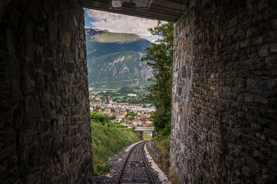 Footpath amidst buildings