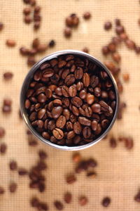 Directly above shot of coffee beans in container