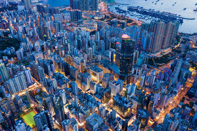 High angle view of city lit up at dusk