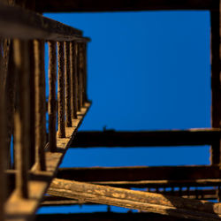 Low angle view of built structure against blue sky