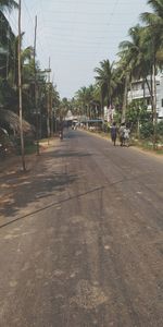 People walking on road in city