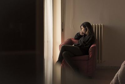 Woman sitting on bench