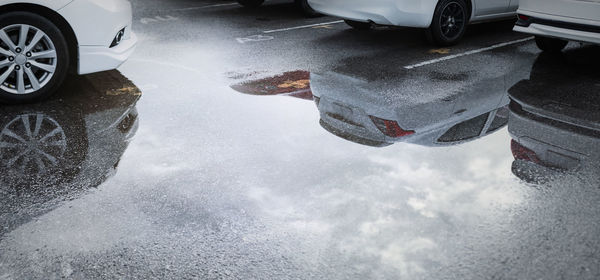 High angle view of snow on road during rainy season