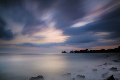 Scenic view of sea against sky at sunset