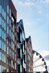 Facades of modern residential buildings. urban environment. vertical photo