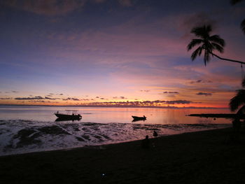 Scenic view of sea against sky at sunset