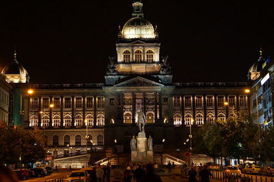 Illuminated buildings in city at night