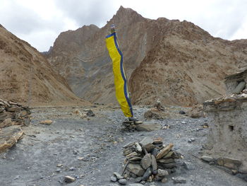 Rock formation on land against sky