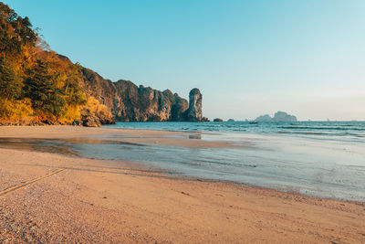 Scenic view of beach against clear sky