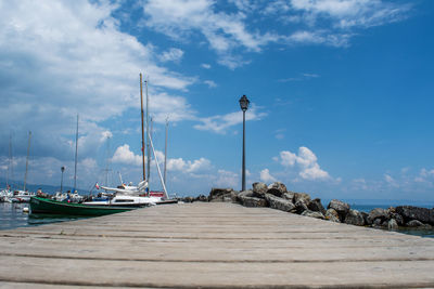 Boats on sea against sky