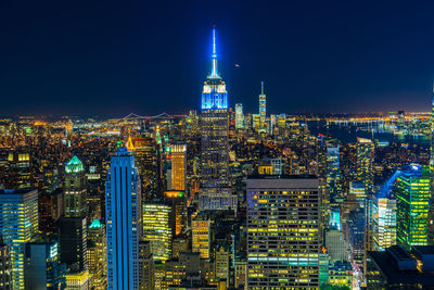 Illuminated buildings in city at night