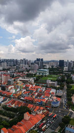 High angle view of buildings in city against sky