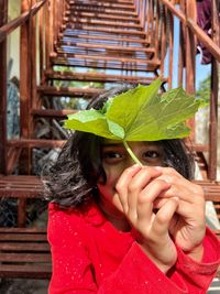 Portrait of young woman looking away