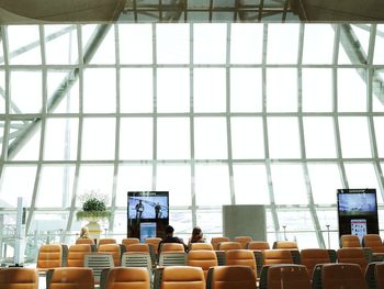 Rear view of people at airport 