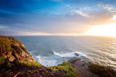 Scenic view of sea against sky during sunset