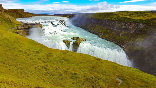 Scenic view of water flowing through rocks