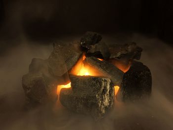Close-up of fire burning in wood