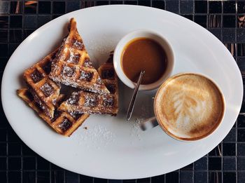 High angle view of coffee on table