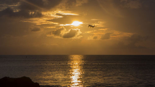 Scenic view of sea against sky during sunset