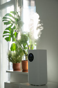 Close-up of mobile phone on table