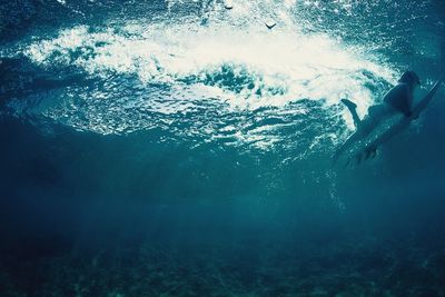 Man swimming in sea