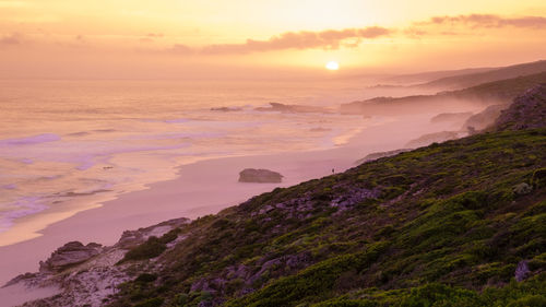 Scenic view of sea against sky during sunset