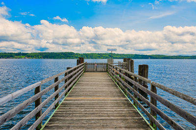 Pier over sea against sky