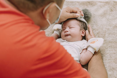 High angle view of baby sleeping 