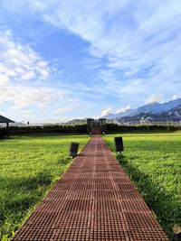 Scenic view of path towards the viewpoint against sky