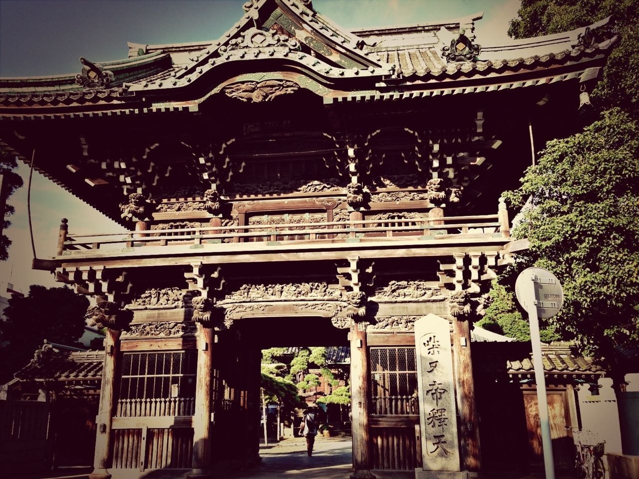 architecture, built structure, building exterior, place of worship, religion, spirituality, low angle view, ornate, temple - building, famous place, travel destinations, sky, facade, tradition, entrance, outdoors, temple, history, architectural feature