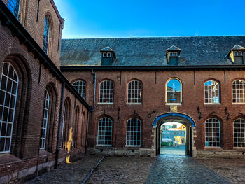 View of illuminated buildings against clear sky