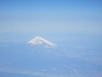 Scenic view of snowcapped mountain against sky