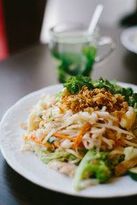 Close-up of food in plate on table