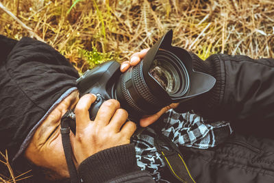 Midsection of man photographing