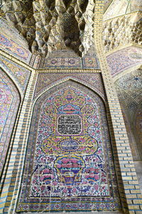 Low angle view of ornate ceiling of building