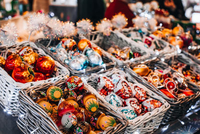 Christmas market with colored holiday toys and souvenirs. winter season. new year atmosphere