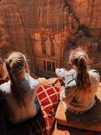 Rear view of women in traditional clothing