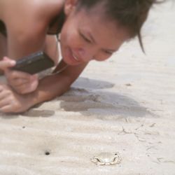 Woman playing with ball in background