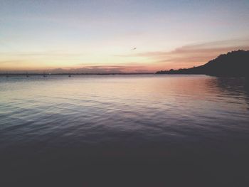 Scenic view of sea at sunset