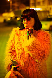 Young woman with sunglasses in winter