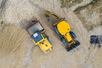 High angle view of yellow construction site at beach