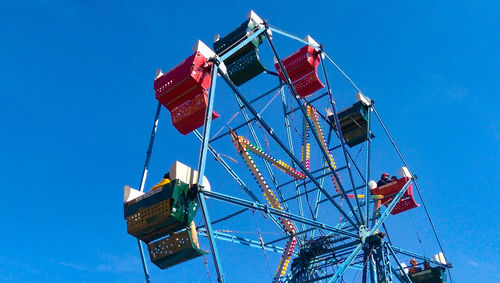 Low angle view of built structure against clear blue sky