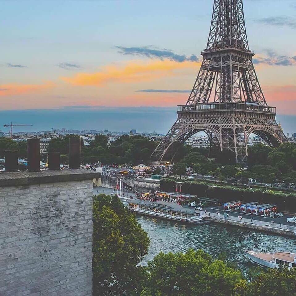 sky, city, bridge - man made structure, architecture, travel destinations, sunset, river, history, outdoors, tree, cityscape, cloud - sky, built structure, scenics, cultures, large group of people, water, people, day