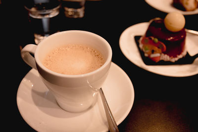 High angle view of coffee cup on table