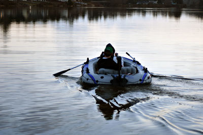 Boats in calm lake