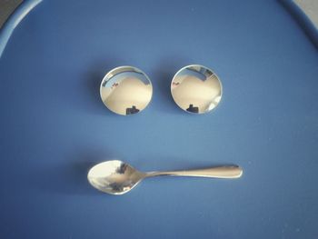 Close-up of spoons and mirrors