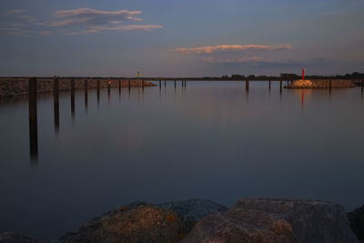 Scenic view of sea against sky at sunset