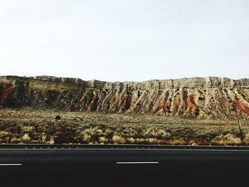 Scenic view of rock formation against clear sky