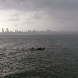 Boats sailing in sea